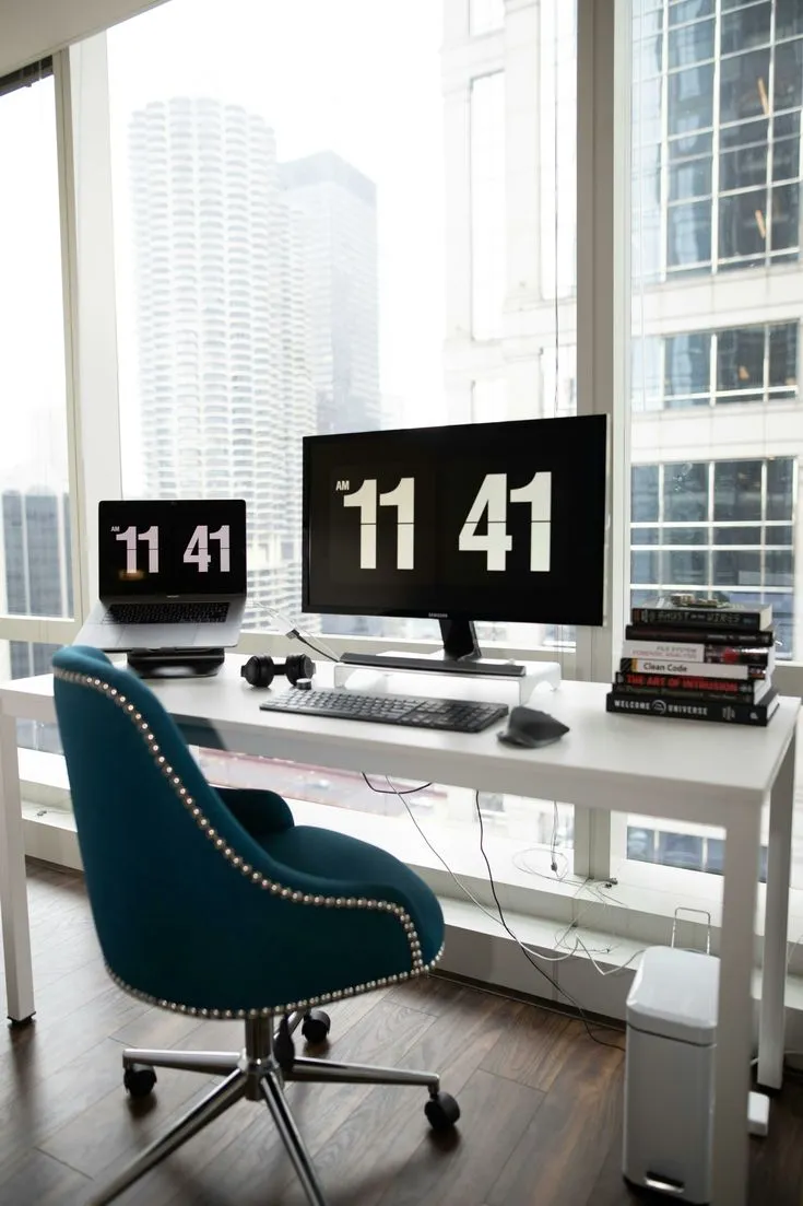 Analyst reviewing desk measurements on screen